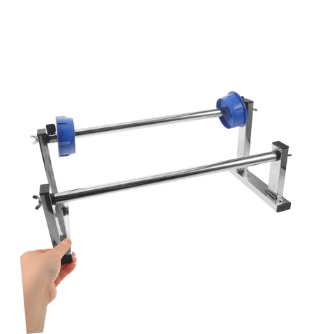 Manual Stretch Film Tool With Cutter And Adjustable Hand Operated Wrap Dispenser Stand For Easy Warehouse Wrapping Of Regular Supplies And Cargo Packaging Film In Lightweight Metal Plastic Construction, angled view