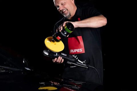 Person using dual action polisher with 100mm DA Fine Dual Action Foam Polishing Pad for paint correction and gloss enhancement