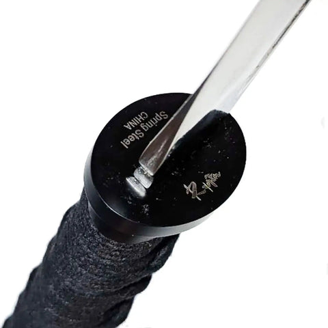 Close-up of the minimalist tsuba on a 30.5 Inch Full Tang Wakizashi Samurai Sword With 65Mn Spring Steel Blade Oil Tempered Edge.