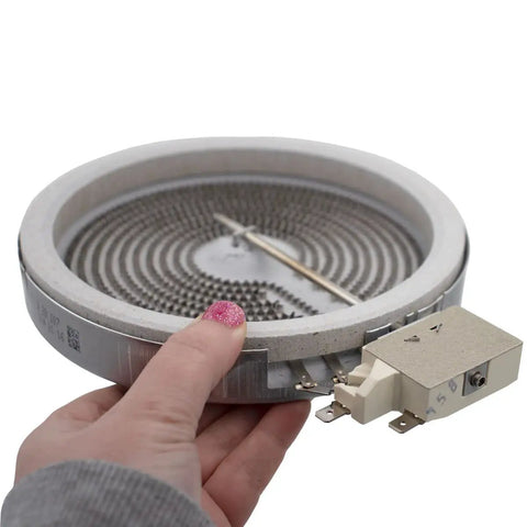 Hand holding a Radiant Surface Element Replacement For Electric Range Six And Three Eighths Inch 1200W DG47-00060A 4010987