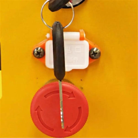 Control panel close-up of Pro Grade Hydraulic Lift Platform Table showing key and red rotation switch for operation.