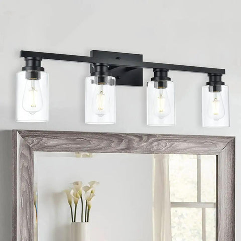 Industrial Indoor Four Light Bathroom Vanity Light In Black With Clear Glass Shades above mirror