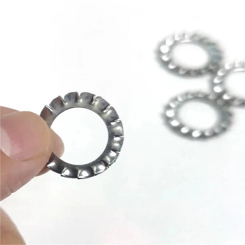 Close-up of a Stainless Steel 304 External Tooth Lock Washer from the 300 Piece Fastener Hardware Kit for automotive and home repairs