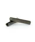 One Eighth Inch By Three Quarters Inch Roll Pin Spring Pin Made From Medium Carbon Steel With Black Oxide Finish, shown close-up.