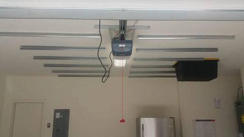 Installed Overhead Garage Storage System With One Or Two Six Tote Sets Using Greenmade 27 Gallon Totes Sold By Costco Patent Protected Design