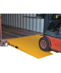 Heavy Duty Steel Shipping Container Ramp For Trucks And Forklifts 16000 Pound Diamond Plate Bridge attached to a forklift.
