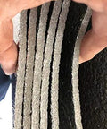 Heavy Duty 1000 Square Foot Double Sided Reflective Foam Insulation Roll 4 Feet Wide By 250 Feet Long showing thick silver layers held in hand.