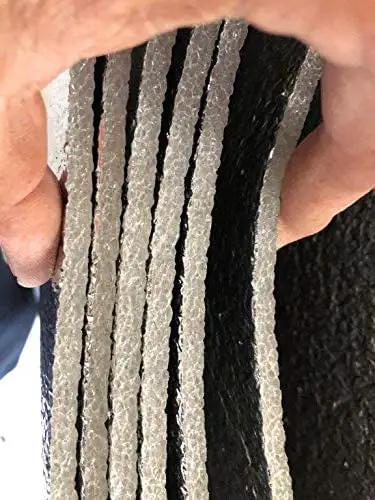 Heavy Duty 1000 Square Foot Double Sided Reflective Foam Insulation Roll 4 Feet Wide By 250 Feet Long showing thick silver layers held in hand.