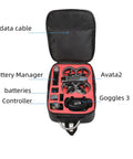 Open red Shoulder Bag For Avata 2 Goggles N3 Dope High Capacity Protective Travel Case with drone, goggles, and accessories inside.