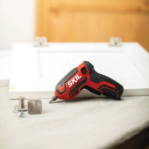 Rechargeable 4V Cordless Screwdriver Kit With 9 Bits, 1 Bit Holder, USB Charging Cable for DIY projects, placed on desk