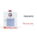 White metal AED cabinet with alarm beacon on top, front window, FOR EMERGENCY USE ONLY label, two keys shown.