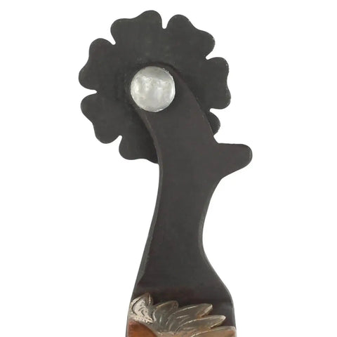 Close-up of Ladies Sunflower Spurs With Flower Overlay In Brown Iron, showing floral detail and craftsmanship.
