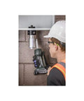 Workhorse Conduit Knockout Punch Set With Rotating Head And Auto Stop in use for conduit box installation by an electrician