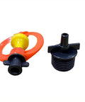 Close-up of yellow and orange part of the 10 Set Half Inch Orange Drip Irrigation Kit with misting dripper and connector