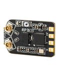 Close-up of RP3 ELRS Nano Receiver For FPV Drones 2.4GHz ExpressLRS module, showing electronic components and connectors.