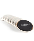 Stack of Medium Round Reusable Carpet Furniture Sliders Set Of Sixteen Three And A Half Inch Anti Slip Moving Pads in beige.
