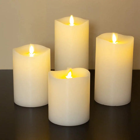 Four flameless pillar candles with melted edges and real flame effect, 6.5 inches tall for cozy home decor ambience.