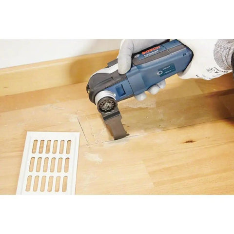 Starlock Oscillating Multi-Tool Bi-Metal Blade 1-1/4 In OSL114JF-3 3-Pack cutting hardwood floor with ease
