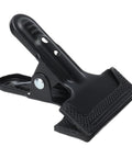 Close-up of a Set Of 4 Heavy Duty Wide Mouth Metal Spring Clamps For Woodworking And Diy Projects Great For Photography Backdrops Bonding Panels Hanging Fabric Papers And Small Fixtures Built From High Hardness Carbon Steel showing textured wide mouth and sturdy steel construction.