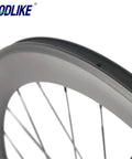 Carbon Road Wheelset 700C Aero 60mm Deep 23mm Wide Clincher For Racing, Basalt Brake Surface, close-up of rim and spokes