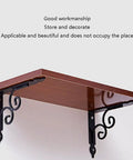 Heavy Hitter Cast Iron Corner Bracket With Ridiculously Strong Wall Mount Legs For Bookshelves Kitchen Cabinets And Outdoor Storage Racks top view showing decorative black support under wooden shelf.