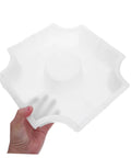 Hand holding Medium Hole Tiles Concrete Mold For Stepping Stones, Reusable DIY Garden Path And Patio Paver Maker, 10.62 X 10.62 X 2.36 In