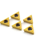 Five triangular tin-coated Carbide Turning Inserts TCMT16T304 TCMT32.51 Positive Cutting Action for steel and cast iron, side view.