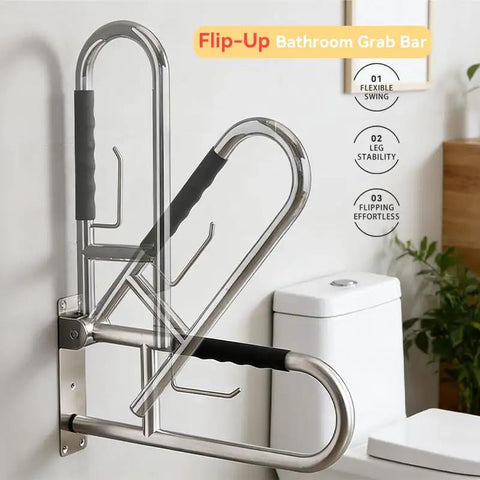 Real Deal 32 Inch Flip Up Toilet Safety Handle In Brushed Nickel Featuring Built In Paper Dispenser And Anti Slip Rubber Knobs Beefy 304 Stainless Steel Construction For Dependable Handicap Assistance And Wheelchair Accessible Restroom Design, angled view mounted on wall.