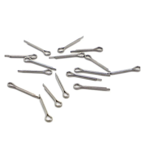 Heavy Duty 304 Stainless Steel U Shaped Spring Cotter Pins In M1 To M6 Sizes scattered on white background for secure fastening.