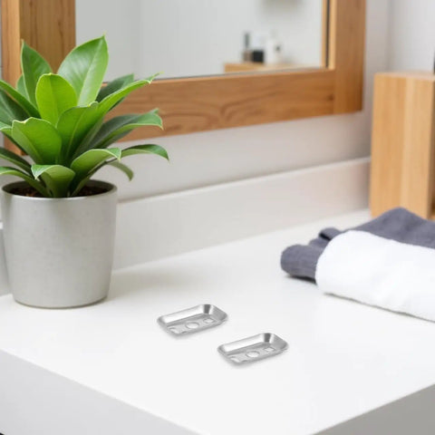 Stainless Steel Towel Bar Mounting Hardware Set With 45x26mm Backing Plates on bathroom countertop near mirror