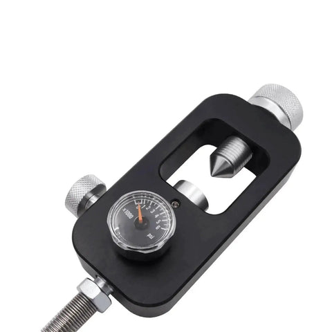 Close-up of scuba yoke K-valve tank refill adapter with gauge, rated for 300 bar 4500 psi, featuring sleek metal finish.