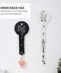 Old School Key Shaped Wall Mounted Coat Hooks Rack In Durable Black Oak Wood For Entryways And Closets Decorative Hanging Organizer That Brings Cool Retro Style And Keeps Your Gear Locked Down Tight No Tools Needed, featuring black and white key-shaped racks with hooks.