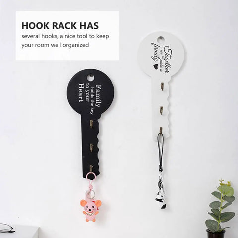 Old School Key Shaped Wall Mounted Coat Hooks Rack In Durable Black Oak Wood For Entryways And Closets Decorative Hanging Organizer That Brings Cool Retro Style And Keeps Your Gear Locked Down Tight No Tools Needed, featuring black and white key-shaped racks with hooks.