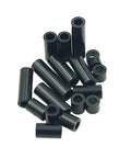 Black ABS Round Spacers Kit For M4 Screws, Unthreaded Standoffs, Metric 7Mm OD By 4.2Mm ID in various sizes laying on surface