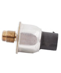 Brake fluid pressure sensor with brass threaded end, silver housing, and black plastic connector