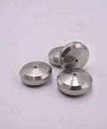 Seat seals, top view: three silver metal discs with central holes for waterjet cutting machines.
