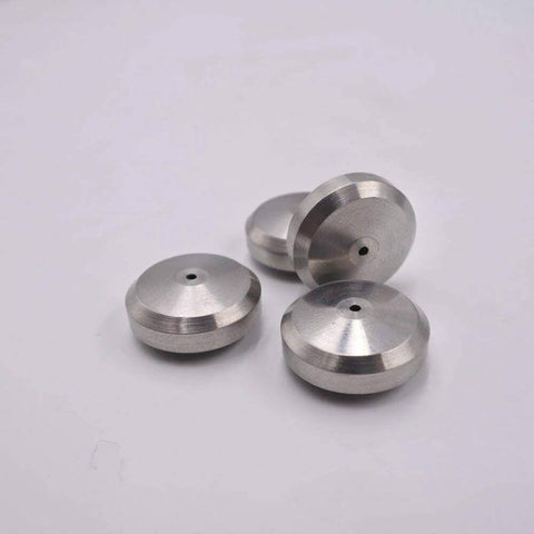 Seat seals, top view: three silver metal discs with central holes for waterjet cutting machines.