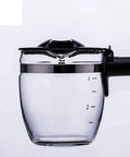 Level Up Your Coffee Game With This Semi Automatic Bean To Cup Machine Featuring A Smooth Soft Touch Screen And Built In Frother For Home Users Making Barista Grade Shots Every Single Time - Glass coffee pot with measurement markings.