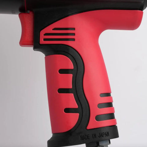 Japan Built One Inch Air Impact Wrench Cranks Through Stuck Nuts Like Butter Delivering 1217 Ft Lbs Of Raw Torque With A Thick Rubber Grip For Serious Shop Work And Truck Repair