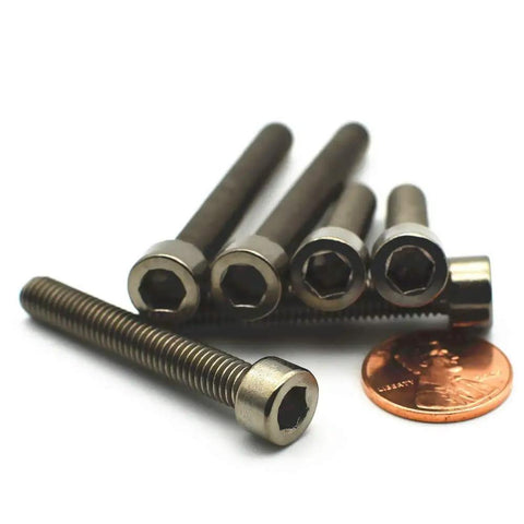 Badass Grade 2 Beefy Titanium M6 Hex Head Bolts 75Mm Long Din912 Standard on white background, with a penny for size reference.