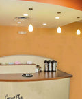 10 Inch Diameter 2 Inch Height Polished Stainless Steel Trash Grommet in a countertop, ideal for hotels and restaurants