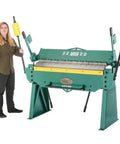 Person standing beside the G0542 Beefy 48 Inch 12 Gauge Pan And Box Brake Heavy Duty Metal Fabrication Tool with handles raised.