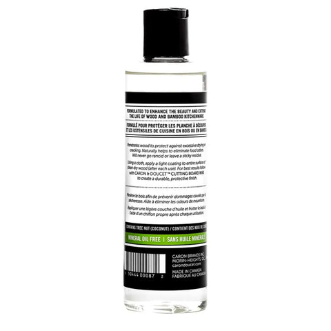 Bottle of 100 Percent Coconut Derived Cutting Board Oil For Wood And Bamboo Conditioning And Finishing Vegan Mineral Oil Free Non Toxic Sealant, 8 oz, back view.
