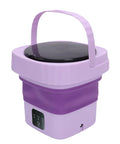 Hassle Free Mini Folding Washing Machine With Quick Ten Or Fifteen Minute Cycles And Hidden Carry Grip, compact purple design.