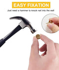 Heavy Duty Double Headed Picture Hangers And Thumb Tacks Pack Of Fifty Pieces For Hassle Free Wall Mounting With A Rock Solid Grip using a hammer to apply a thumb tack.