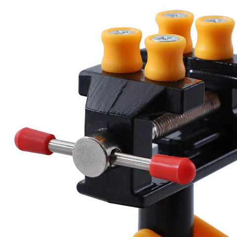 Close-up of Universal Mini Suction Vise Clamp With 360 Degree Rotation showing aluminum body and red-tipped handle.