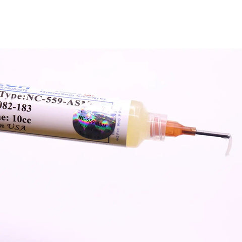 Close-up of No Clean Flux Gel Paste for Soldering with Needle Dispensing Tool 559 ASM showing syringe and needle tip.