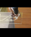 Person using drill to install Must Have LED Neon Mounting Clips Pack 200 Durable PVC Fixing Clips for 6mm Neon Flex Strips