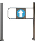 Heavy Duty Self Closing Safety Gate With Post Mount For Commercial Walkways And Home Entrances Featuring Smooth Swing Design With Solid Internal Spring For One Way Foot Traffic In Silver Aluminum Finish with upward direction sign.