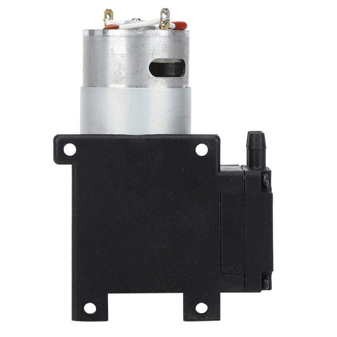 Side view of a Tiny 10 Liters Per Minute DC Vacuum Pump With 81 kPa Negative Pressure 24V DC Compact Lab And Home Medical Gear